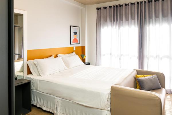 Cama o camas de una habitación en Xtay Citizen Paulista