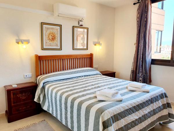 Cama o camas de una habitación en Marina Tower