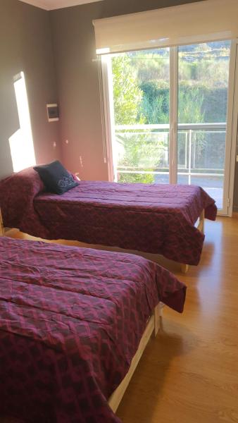Cama o camas de una habitación en Altos de tandilia