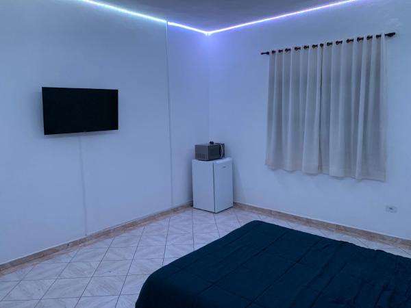Cama o camas en una habitación de un apartamento suite cerca del metro Centre - Jardim São Paulo