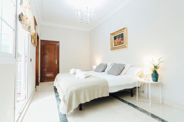 Cama o camas de una habitación en Exclusivo Alojamiento en el centro Sevilla
