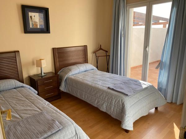 Cama o camas de una habitación en Villa Los Altos, La Herradura, Almuñecar