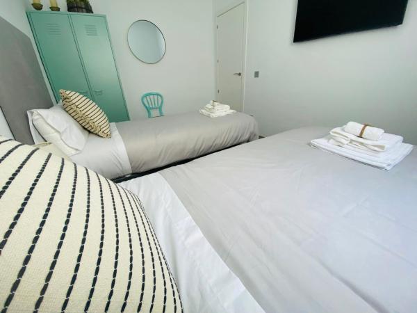 Cama o camas de una habitación en Bonito Apartamento de 2 habitaciones con terraza