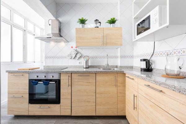 Una cocina o zona de cocina en Apartamento Residencial Limonar