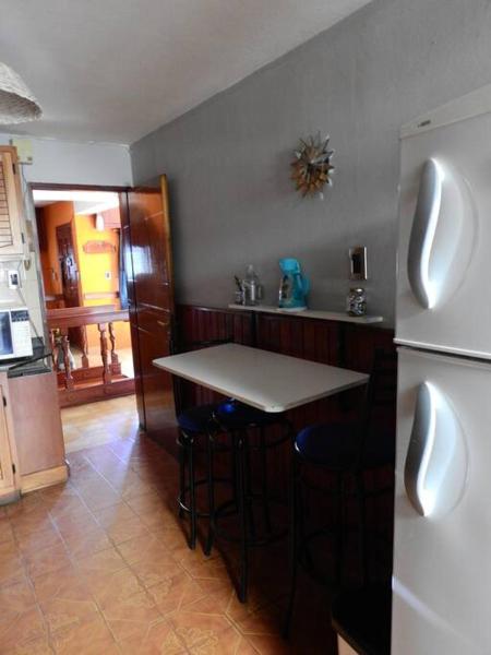 Una cocina o zona de cocina en Casa Centro Bariloche.  4 pax