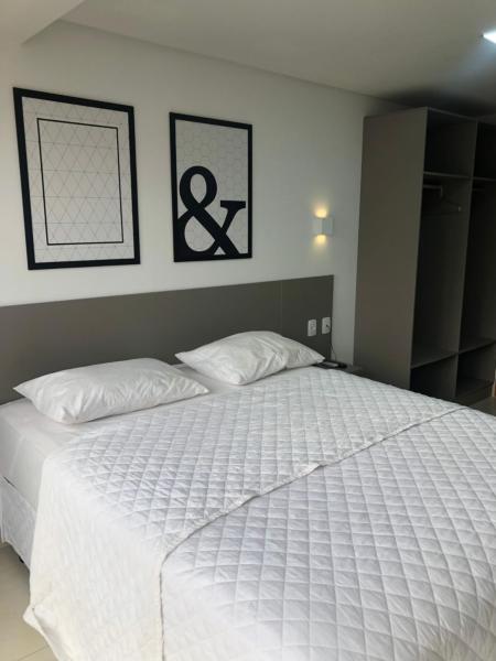 Cama o camas de una habitación en Manaira Apart Hotel