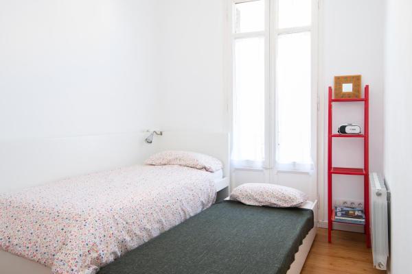 Cama o camas de una habitación en Barcelona cozy apartment