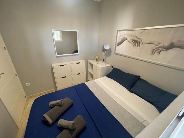 Cama o camas de una habitación en Nino de SteraM Flats Torremolinos