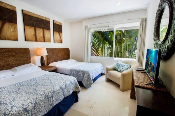 Cama o camas de una habitación en Caribbean House, Playa del Carmen