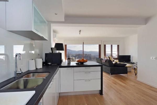 Una cocina o zona de cocina en Penthouse with spectacular views Faroles 4