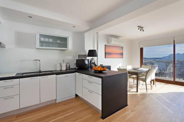 Una cocina o zona de cocina en Penthouse with spectacular views Faroles 4