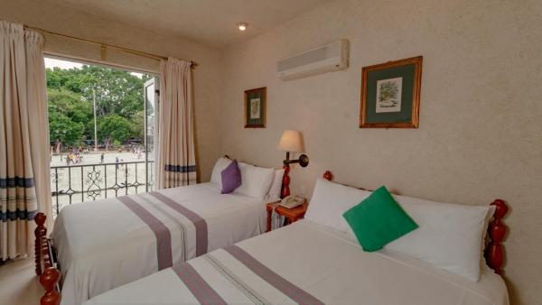 Cama o camas de una habitación en Hotel Marques Del Valle