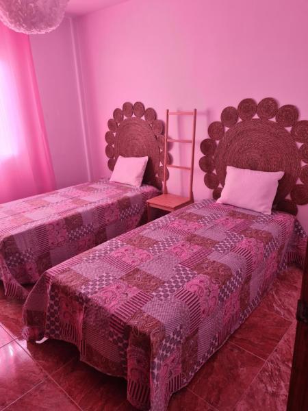 Cama o camas de una habitación en Precioso Apartamento en Tarifa cerca de la playa