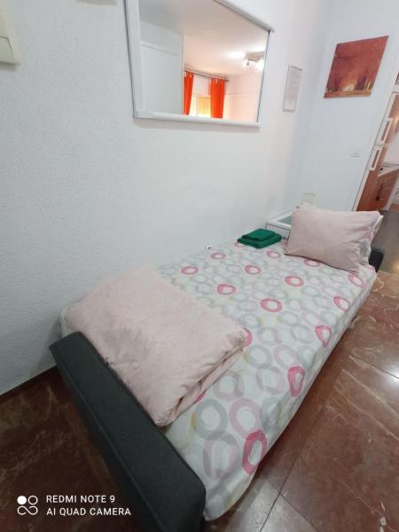 Cama o camas de una habitación en Apartamento Con Encanto 'Larios Studio'