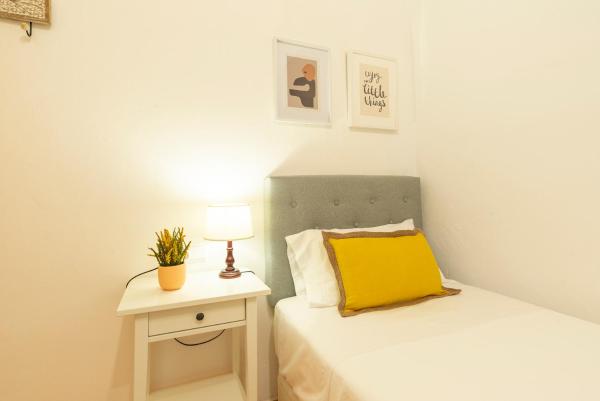 Cama o camas de una habitación en Apartamento Santa Marta 5 Málaga