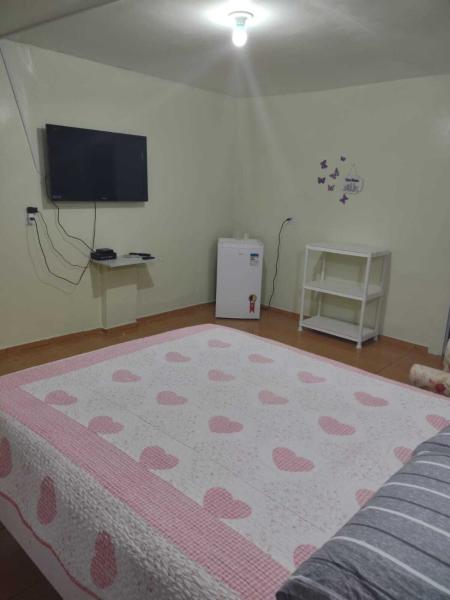 Cama o camas de una habitación en Mimos Pousada