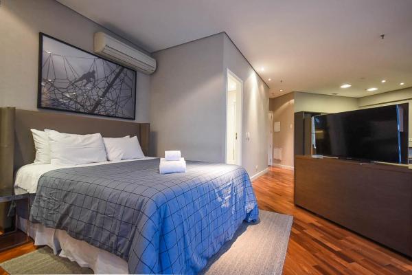 Cama o camas de una habitación en SP Stays Itaim FL Residence