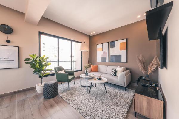 Zona de estar de Apartamento con servicios completos en Regatta Living - 7B