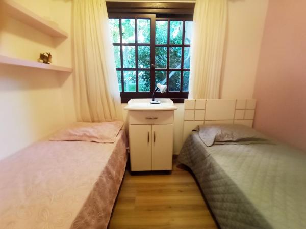 Cama o camas de una habitación en Residencial Lago Negro