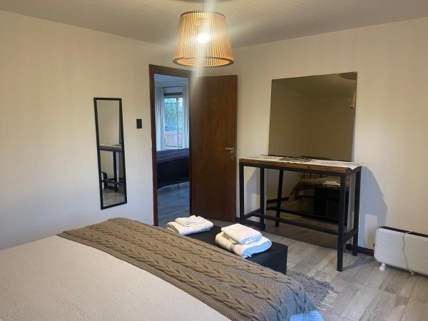Cama o camas de una habitación en Patagonia Hope Suites
