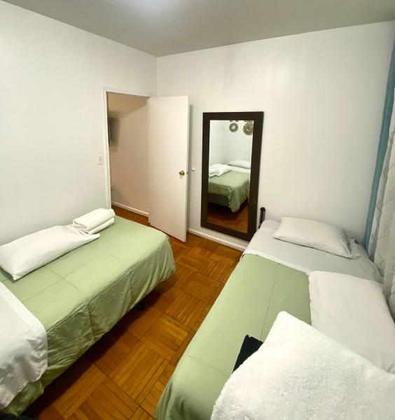 Cama o camas de una habitación en Cozy Apartment in Manhattan