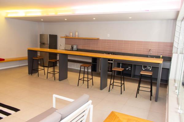 Cocina o zona de cocina de 360 ​​Suites Av.  Ipiranga