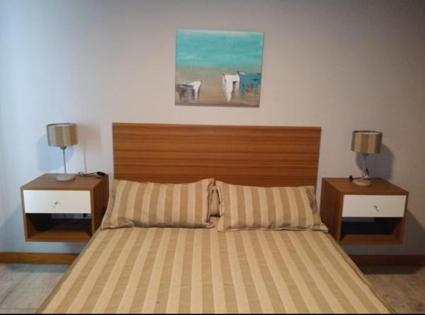 Una cama o camas en una habitación de Complejo Rafina Villa Gesell