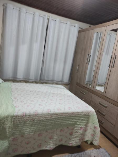 Cama o camas de una habitación en Suíte Maciel