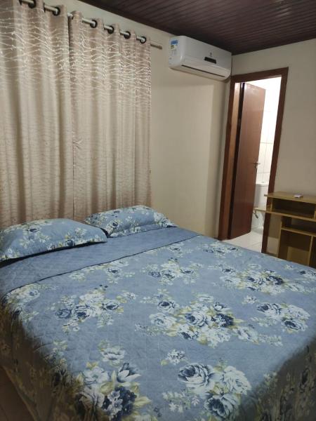 Cama o camas de una habitación en Suíte Maciel