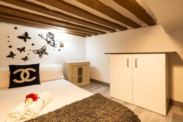 Cama o camas de una habitación en Apartamentos Day Madrid VALLE Centro Gran Via Sol Malasaña