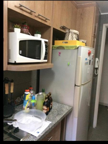 Una cocina o zona de cocina en el Departamento en Reñaca mínimo 5 noches con estacionamiento privado