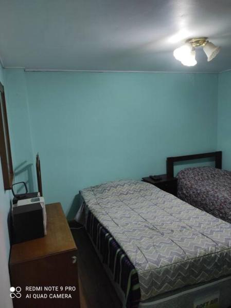 Cama o camas de una habitación en Casa Alegre Viña del Mar