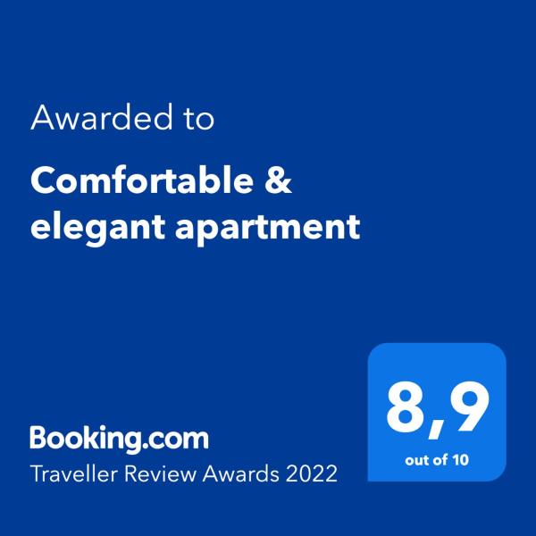 una pantalla azul con el texto otorgado a una cómoda cita en elefante en Comfortable & elegant apartment en Buenos Aires