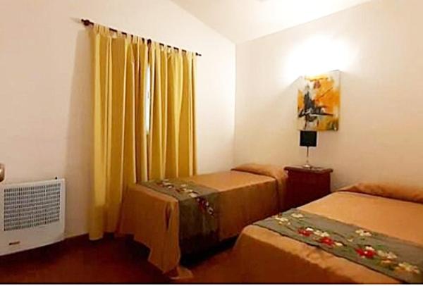 Cama o camas de una habitación en Departamento zona centrica en Villa Carlos Paz