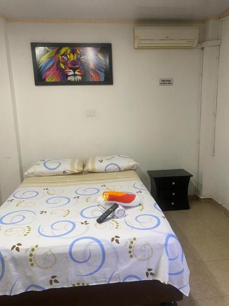 Cama o camas de una habitación en Confort apartaestudio completo Aire acondicionado Todo independiente