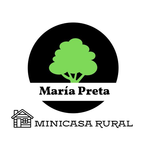un logotipo para una empresa inmobiliaria con un árbol verde en Minicasa Rural Maria Preta en Puerto Iguazú
