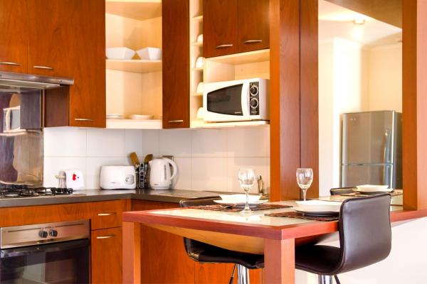 Una cocina o zona de cocina en San Ignacio Suite Apartments