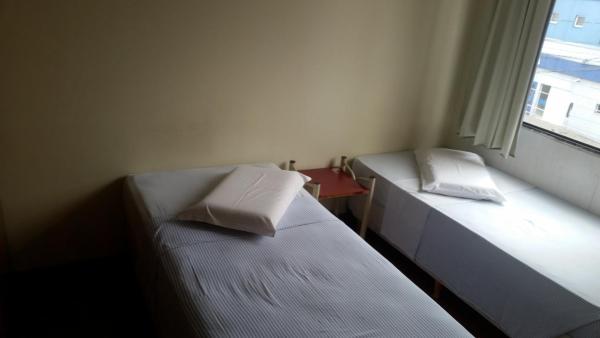 Cama o camas de una habitación en el Hotel Piratini
