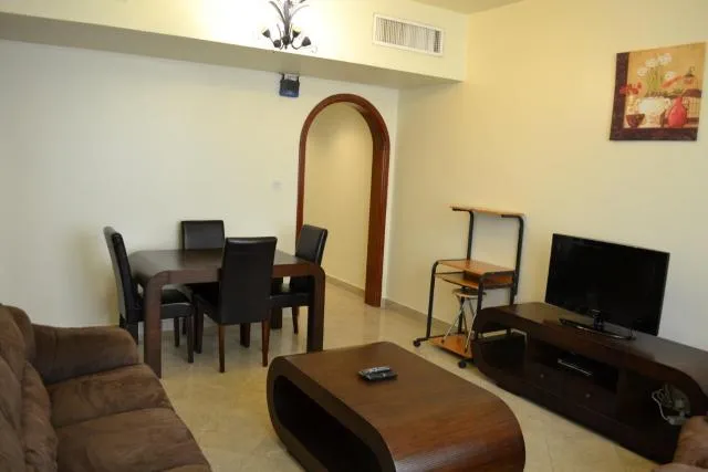  Abu Dhabi Plaza Hotel Apartments - picture  : TV/entertainment centre,Living room,Property 