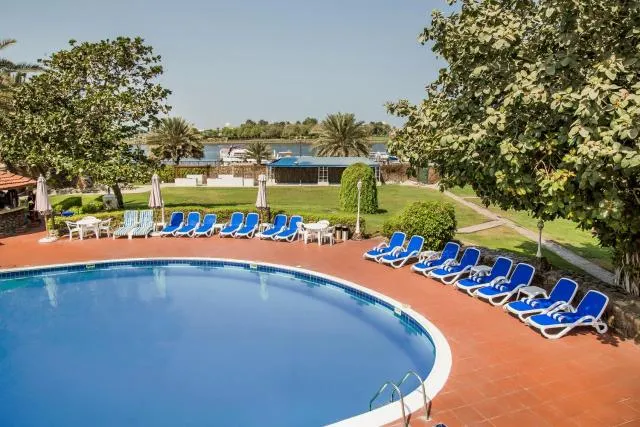  Hotel Holiday International - picture  : Swimming pool,Property 