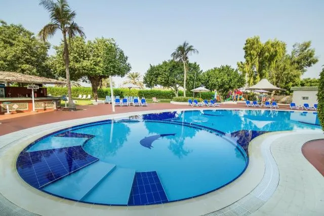  Hotel Holiday International - picture  : Swimming pool,Property 