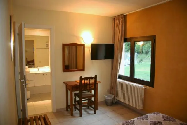  Hotel Sucara - picture  : Dining area,TV/entertainment centre,Bedroom,Property 