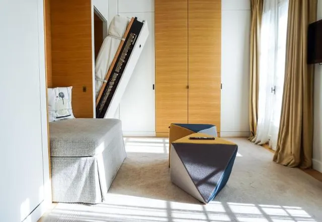  Hotel Marignan Champs-Elysées - photo  : Lit,Salon,Chambre à coucher,enfants,Famille,Propriété,Chambre 