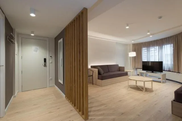  Hotel & Aparthotel Cosmos - picture  : Seating area,TV/entertainment centre,Photo of the whole room,Room 