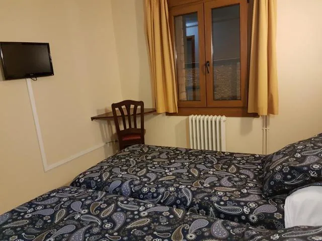  Hotel Arinsal - picture  : TV/entertainment centre,Bed 