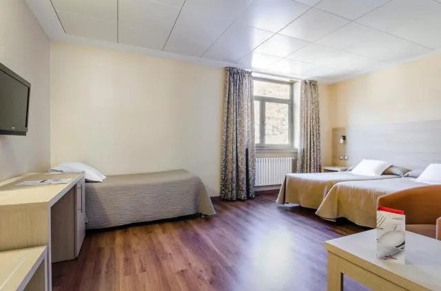  Hotel Panorama - picture  : Bed,Bed,TV and multimedia,Photo of the whole room,Bedroom,Property,Room 