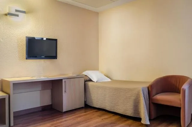  Hotel Panorama - picture  : TV/entertainment centre,Bed,Bed,TV and multimedia,Bedroom,Property,Room 