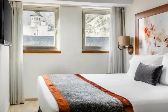  Eurostars Andorra - picture  : Bed,Bed,View (from property/room),Photo of the whole room,Decorative detail,Bedroom,Landmark view,Mountain view,Property,Room 