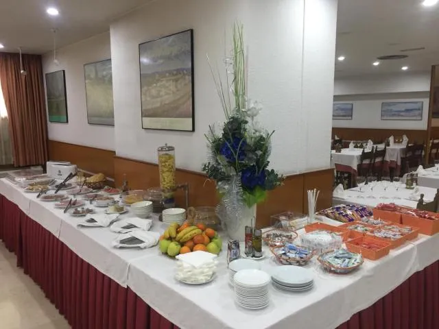  Hotel Folch - picture  : Toilet,Restaurant/places to eat,Food and drinks,Food,Breakfast,Buffet breakfast,Property 