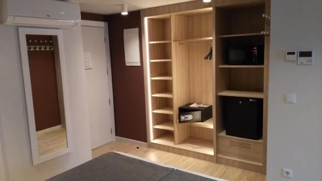  Hotel & Aparthotel Cosmos - picture  : TV/entertainment centre,Photo of the whole room,Room 